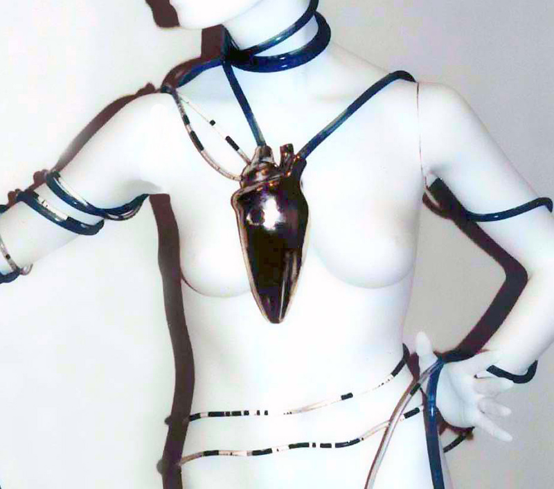 This piece was designed for use on a cat walk and ran from a garden pump heart necklace